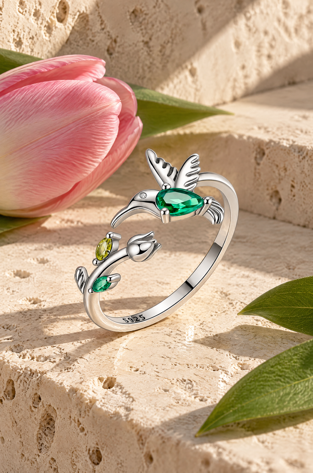 Ventotene hummingbird ring, beside a tulip