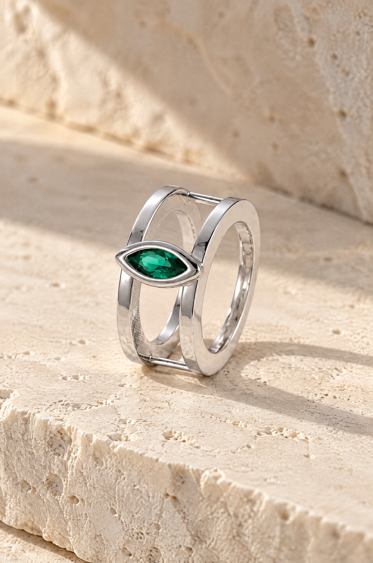Silver Cefalù marquise ring cover on travertine