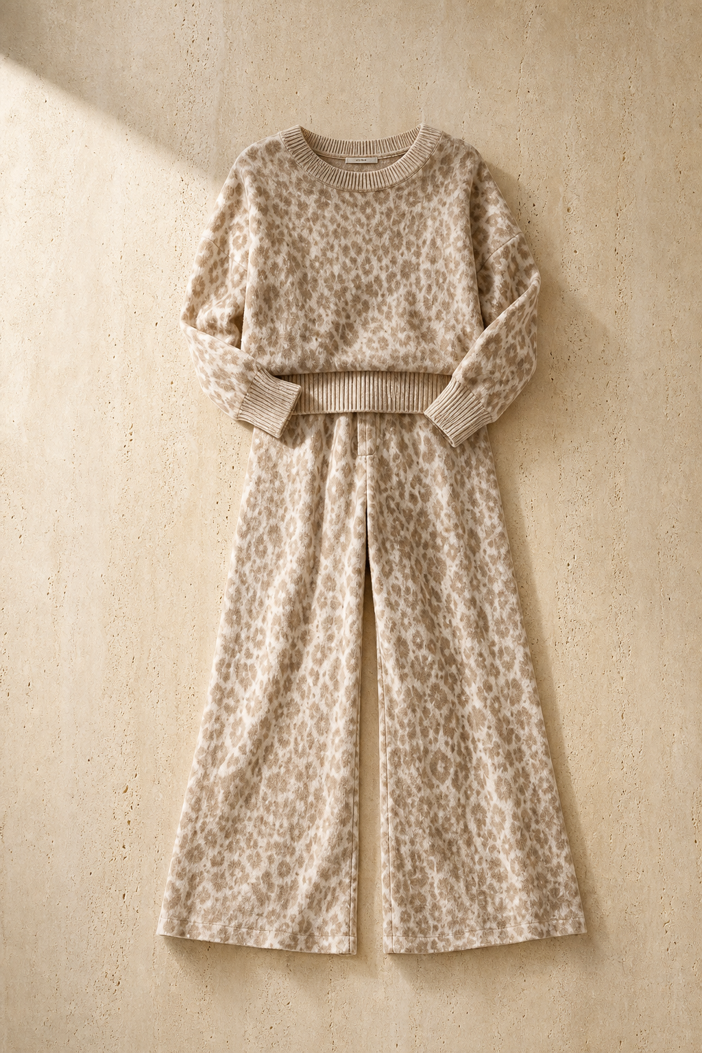 Conca leopard set, catalog hero on travertine