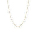 Stellina station necklace in yellow gold, full length on white