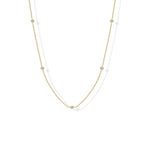 Stellina station necklace in yellow gold, full length on white