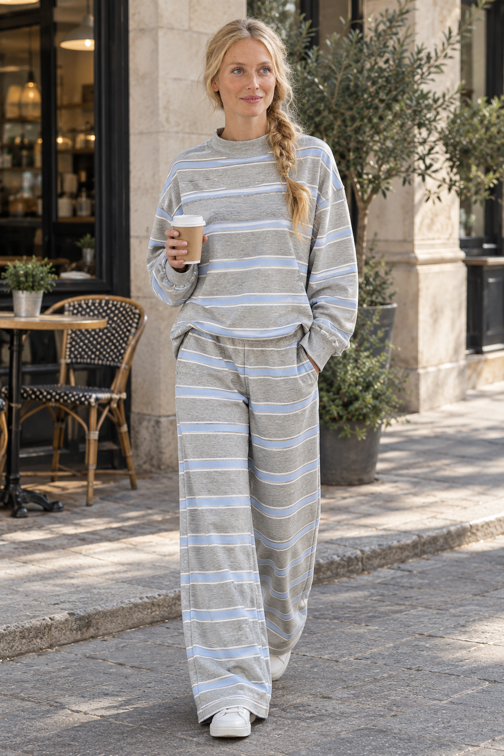 Minori stripe set in grey, worn on a cafe street