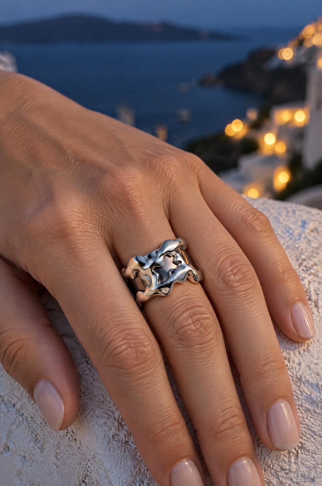 Woman at blue hour wearing the silver Filicudi ring cover