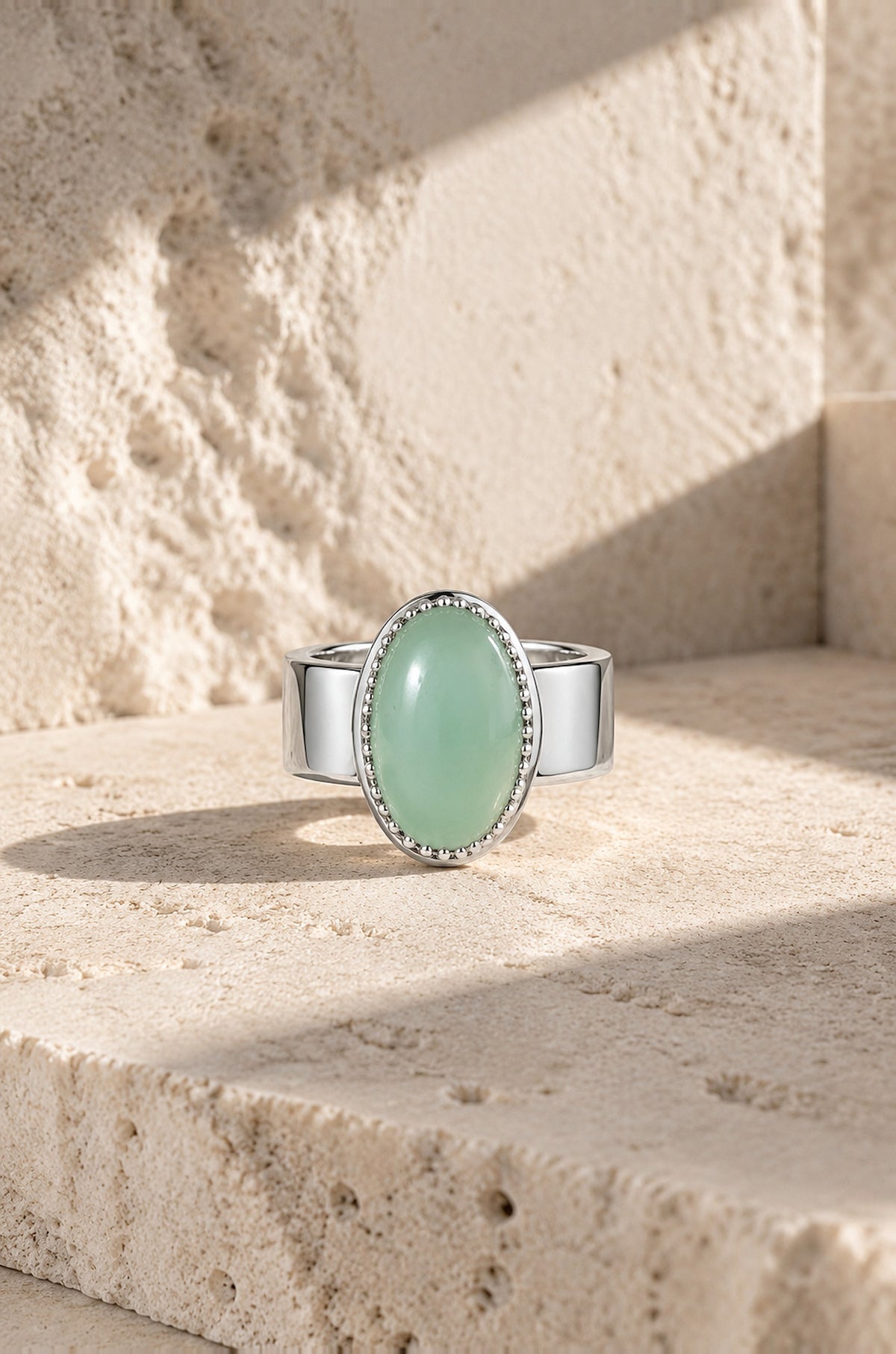 Giglio ring cover with a sea green stone