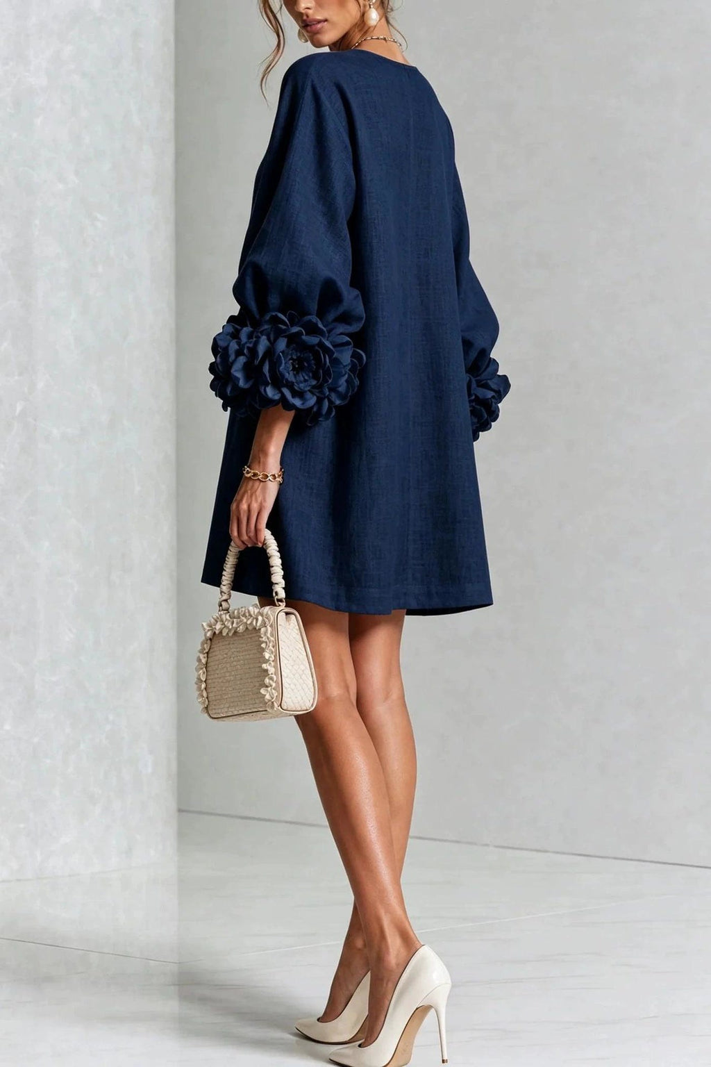 Petalo puff sleeve dress in navy blue, back view