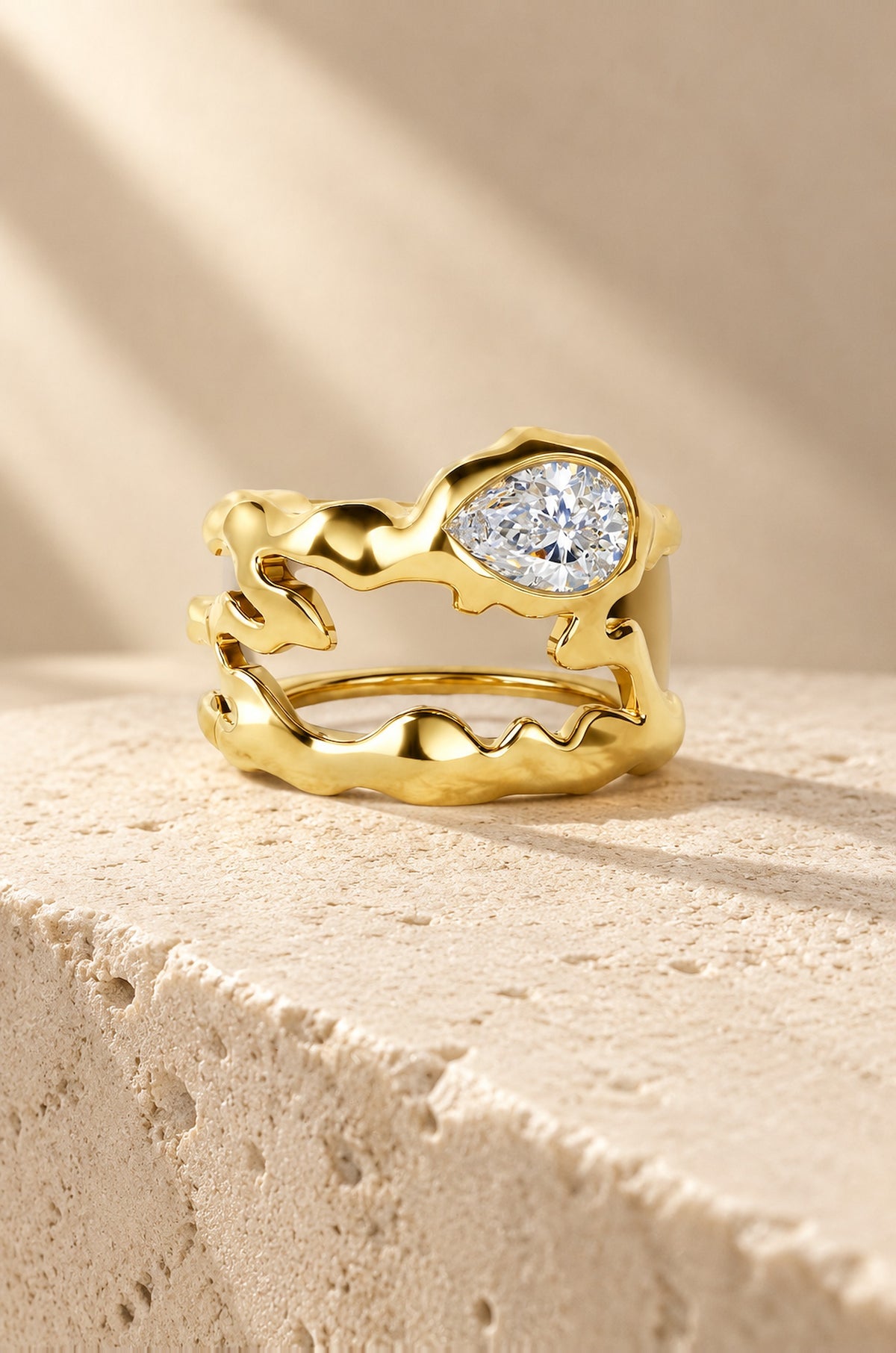 Vulcano ring cover in gold on travertine